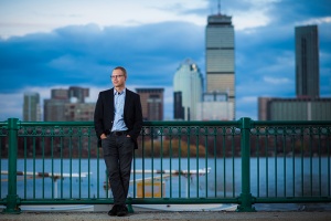 Rich Nielsen in front of Charles River and Boston in the background