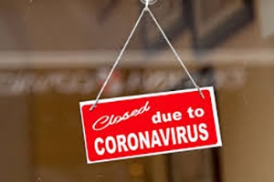 sign that reads Closed due to Coronavirus