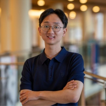 Student Bumjun Park in a navy polo shirt