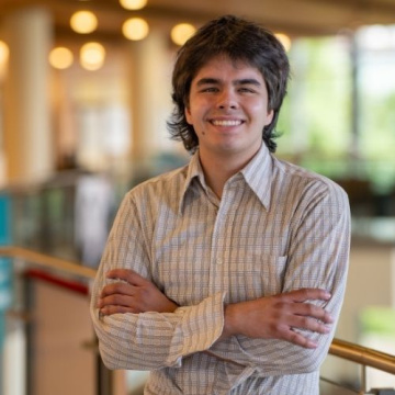 Student Tariq Ravasia in a collared shirt