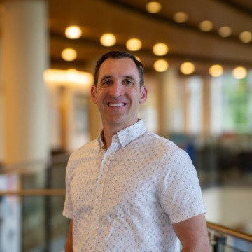 Student Travis Zahnow in a collared shirt